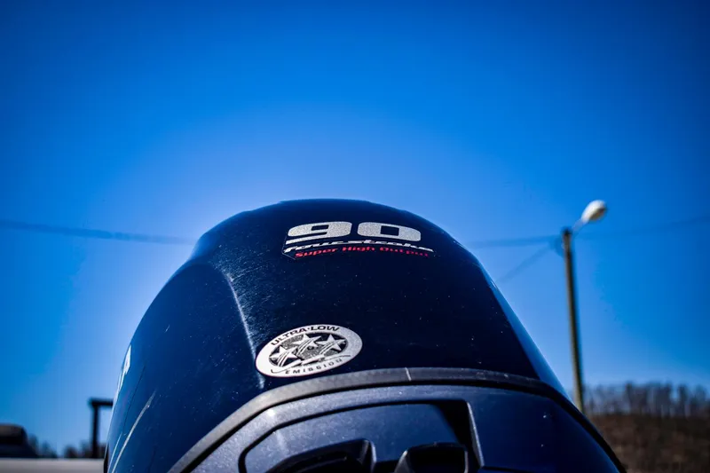 Slide: The Image of 2024 Bennington 20 SVSBSR boat engine under clear blue sky. - 22