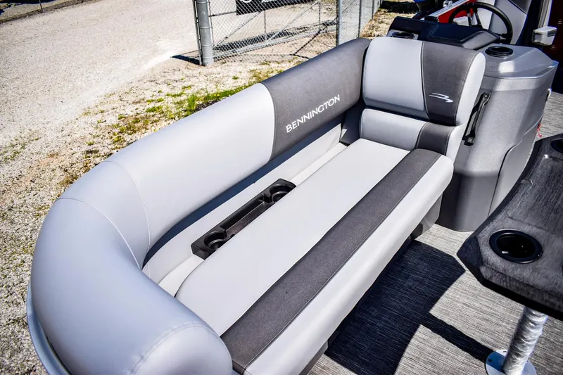 Slide: The Image of 2024 Bennington 20 SVSBSR boat interior with gray and black seating. - 5