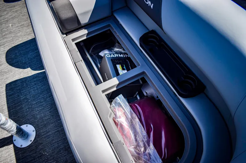 Slide: The Image of 2024 Bennington 20 SVSBSR boat storage compartment with Garmin equipment. - 8