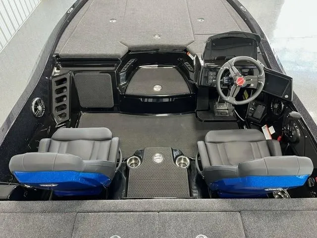 Slide: The Image of 2024 iKon LX20 boat interior with dual seats and steering console. - 11