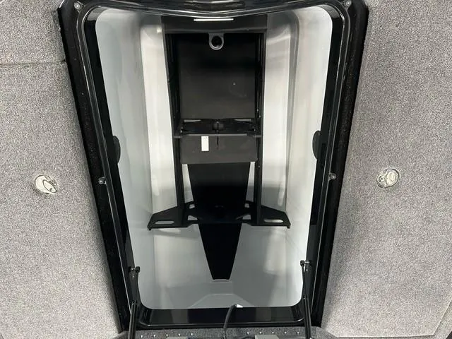Slide: The Image of 2024 iKon LX20 boat storage compartment with open hatch. - 16