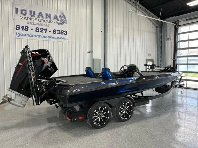 Slide: The Image of 2024 iKon LX20 boat on trailer at Iguana Marine Group showroom. - 3