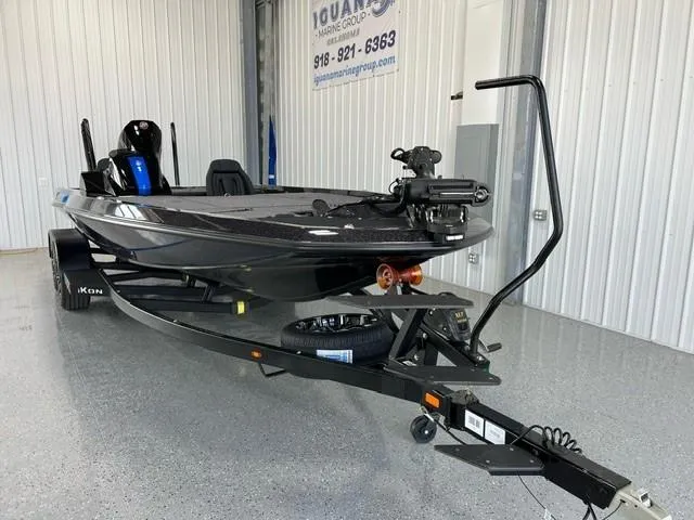 Slide: The Image of 2024 iKon LX20 fishing boat on trailer in showroom. - 5