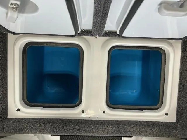 Slide: The Image of iKon LX20 2024 model dual storage compartments with blue interiors. - 6