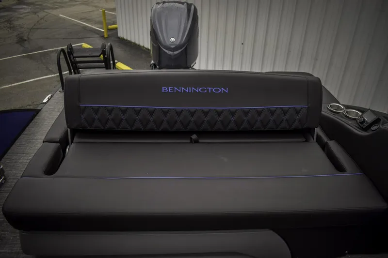 Slide: The Image of 2024 Bennington 23 RSBSR boat with luxurious seating and modern design. - 5
