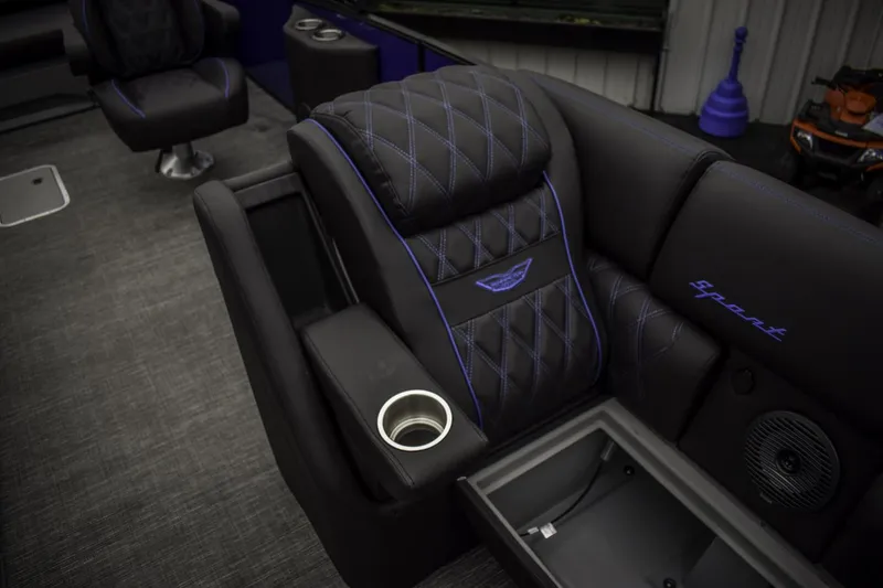 Slide: The Image of Luxurious seating on the 2024 Bennington 23 RSBSR pontoon boat with cup holder and storage. - 9