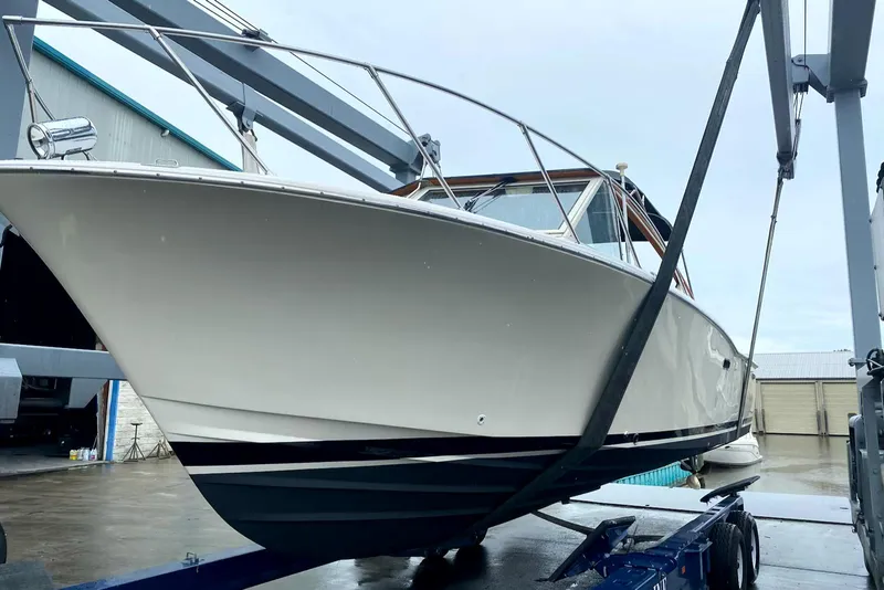 Slide: The Image of 1977 Chris-Craft 30 Sportsman boat on trailer, ready for transport. - 10