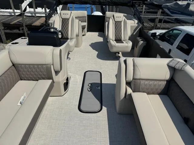 Slide: The Image of 2024 Harris FloteBote Sunliner 230 pontoon boat interior with luxurious seating. - 3