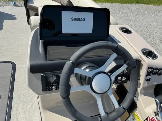 Slide: The Image of 2024 Harris FloteBote Sunliner 230 steering console with Simrad display. - 5