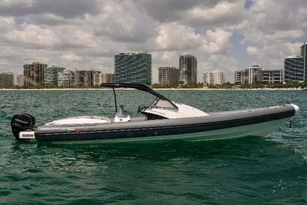 Slide: The Image of 2025 Panamera Yacht PY 100 on water with city skyline background. - 28
