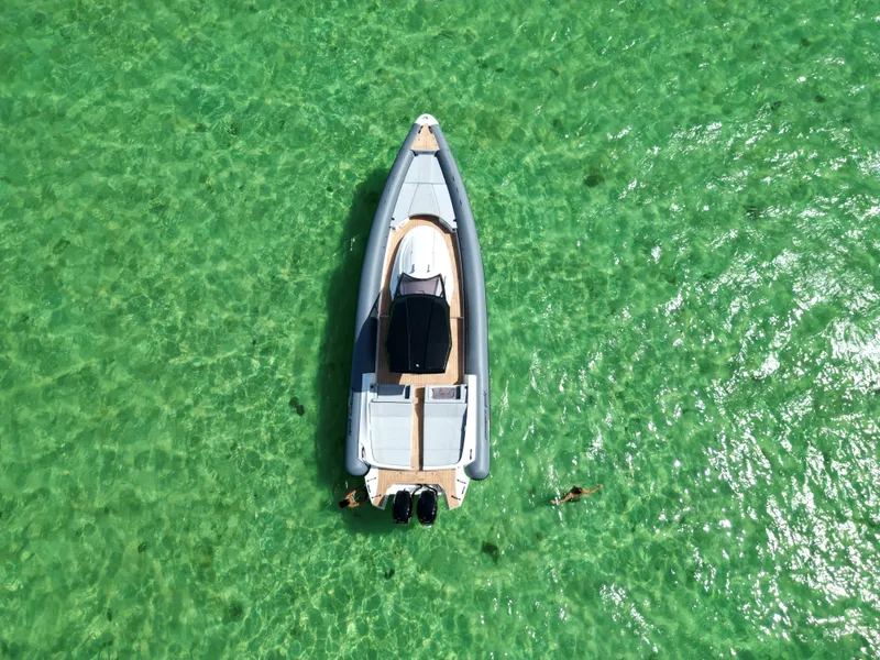 Slide: The Image of Aerial view of 2025 Panamera Yacht PY 100 in clear turquoise water. - 3