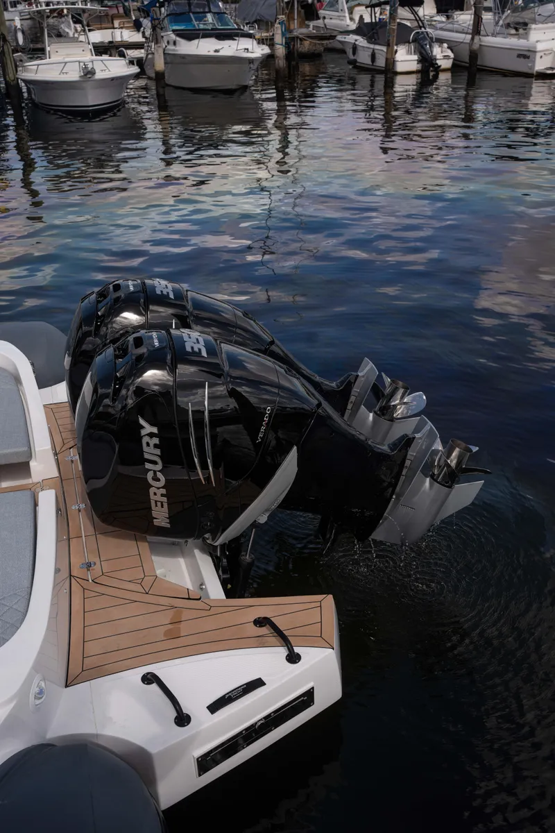 Slide: The Image of Panamera Yacht PY 100 (2025) with Mercury outboard engines docked at marina. - 11