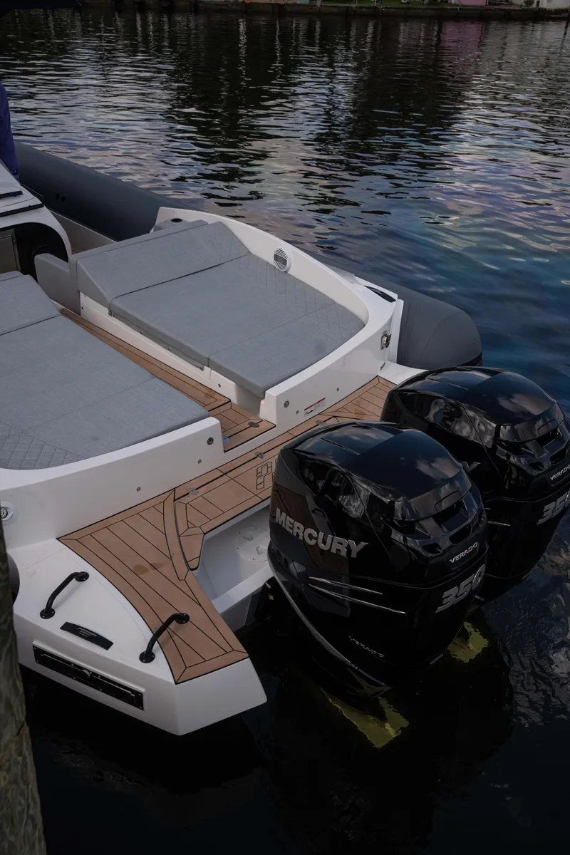 Slide: The Image of 2025 Panamera Yacht PY 100 with dual Mercury outboard engines. - 13