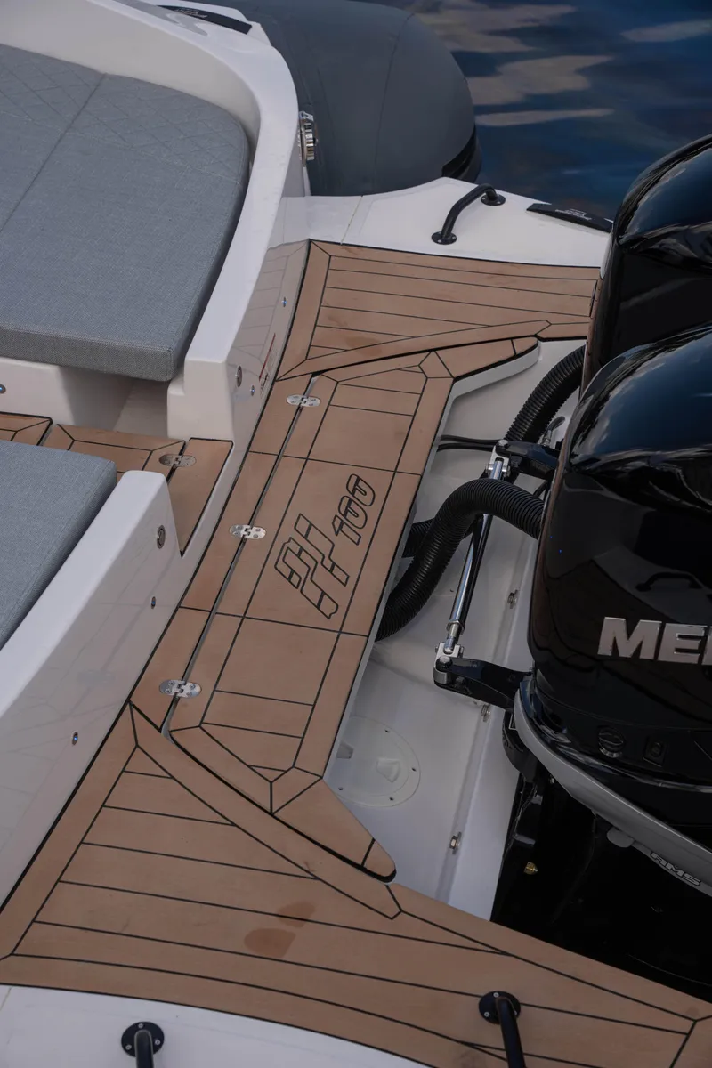 Slide: The Image of Panamera Yacht PY 100 2025 model with teak deck and Mercury outboard engines. - 14