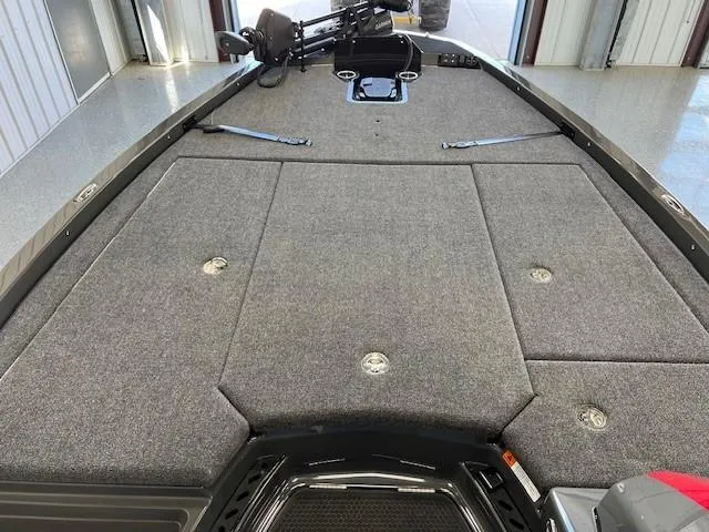 Slide: The Image of 2024 iKon LX21 boat with spacious deck and storage compartments. - 10