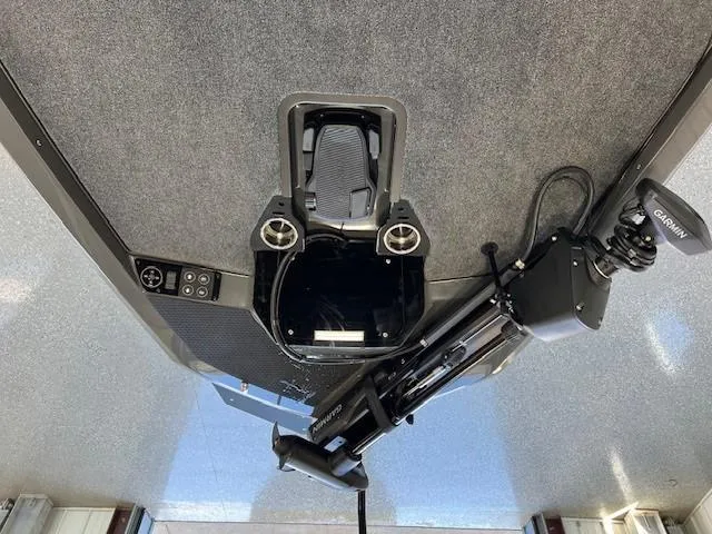 Slide: The Image of 2024 iKon LX21 boat deck with Garmin trolling motor and control panel. - 12