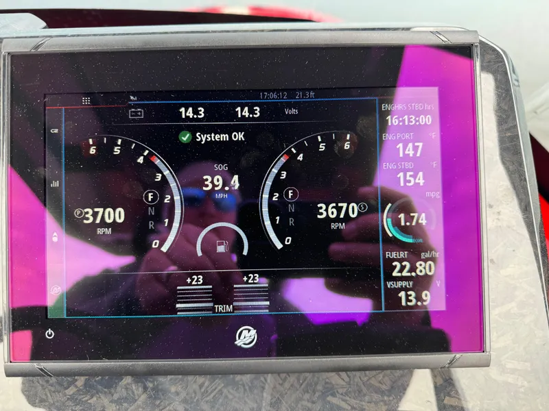 Slide: The Image of Dashboard display of 2024 SuperRib Open 30 showing engine performance metrics. - 10