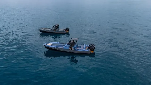 Slide: The Image of Two SuperRib Open 30 boats on calm water, 2025 model. - 27