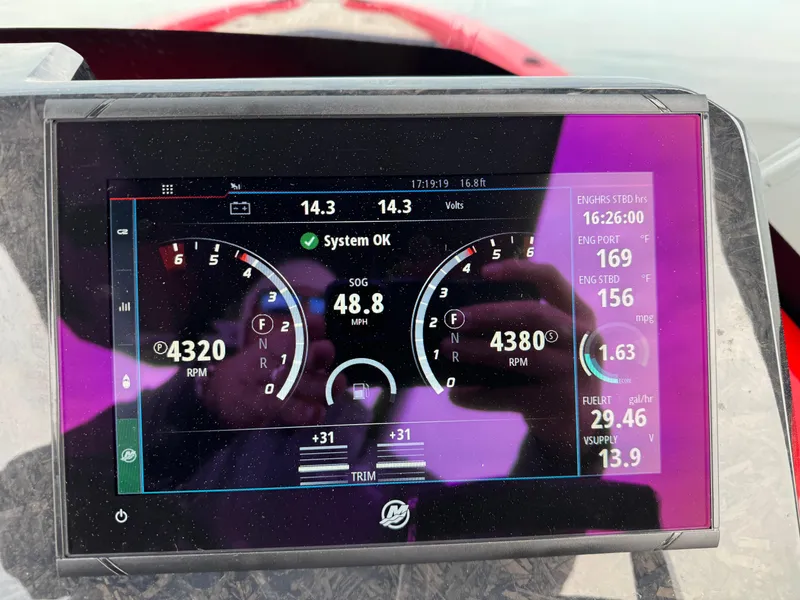 Slide: The Image of Dashboard display of a 2024 SuperRib Open 30 showing engine and speed metrics. - 9