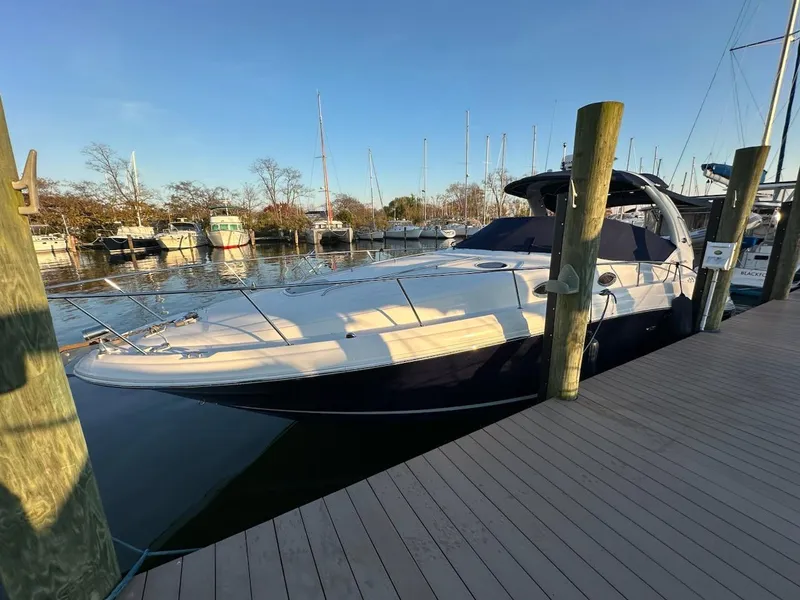 Slide: The Image of 2005 Sea Ray 340 Sundancer yacht docked at marina. - 13