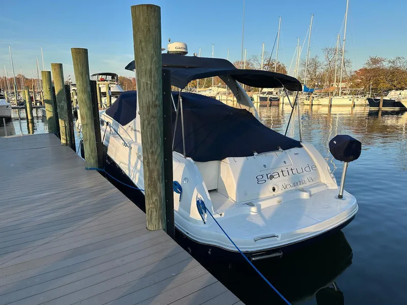 Slide: The Image of 2005 Sea Ray 340 Sundancer docked at a marina. - 7