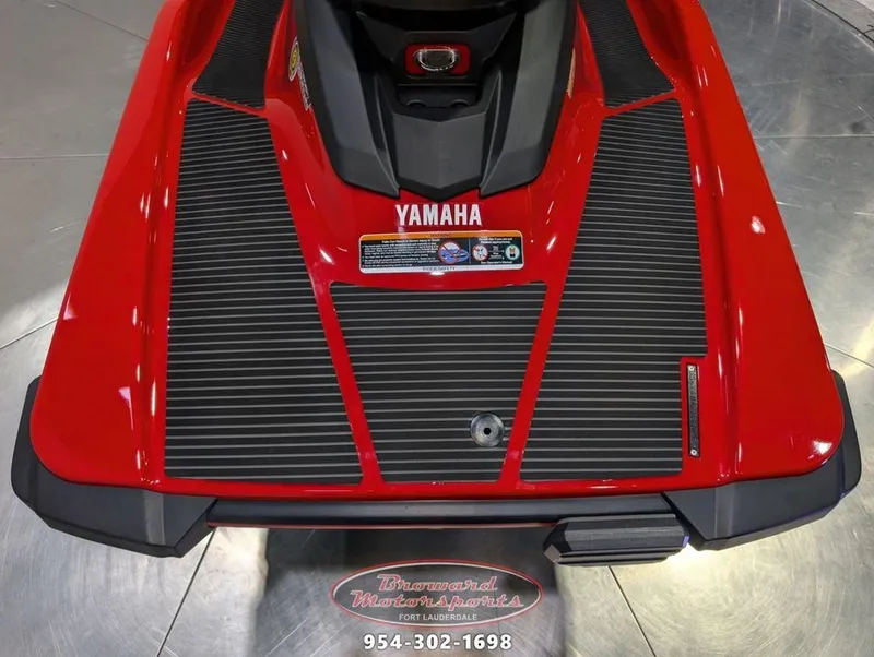 Slide: The Image of 2024 Yamaha EX® Deluxe jet ski, red with black accents, rear view. - 14