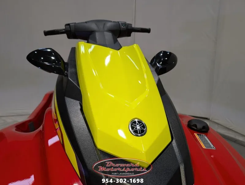 Slide: The Image of 2024 Yamaha EX® Deluxe jet ski, yellow and red, front view. - 17