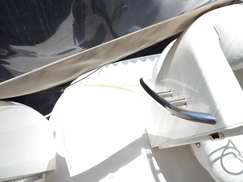 Slide: The Image of Interior seating of 2003 Sea Ray 390 Motor Yacht with white upholstery. - 17
