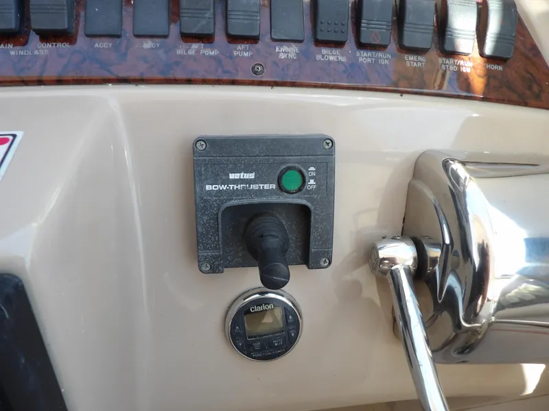 Slide: The Image of Control panel of a 2003 Sea Ray 390 Motor Yacht with bow thruster joystick. - 23
