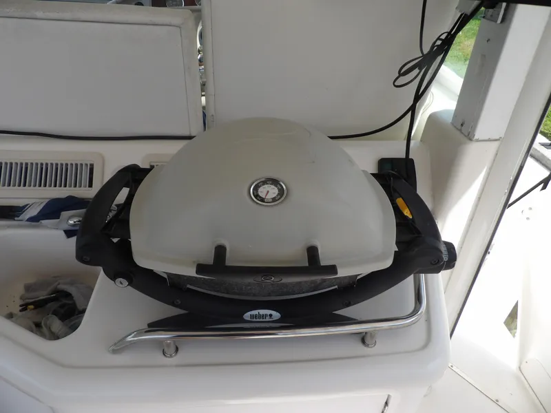 Slide: The Image of Weber grill on 2003 Sea Ray 390 Motor Yacht deck. - 30