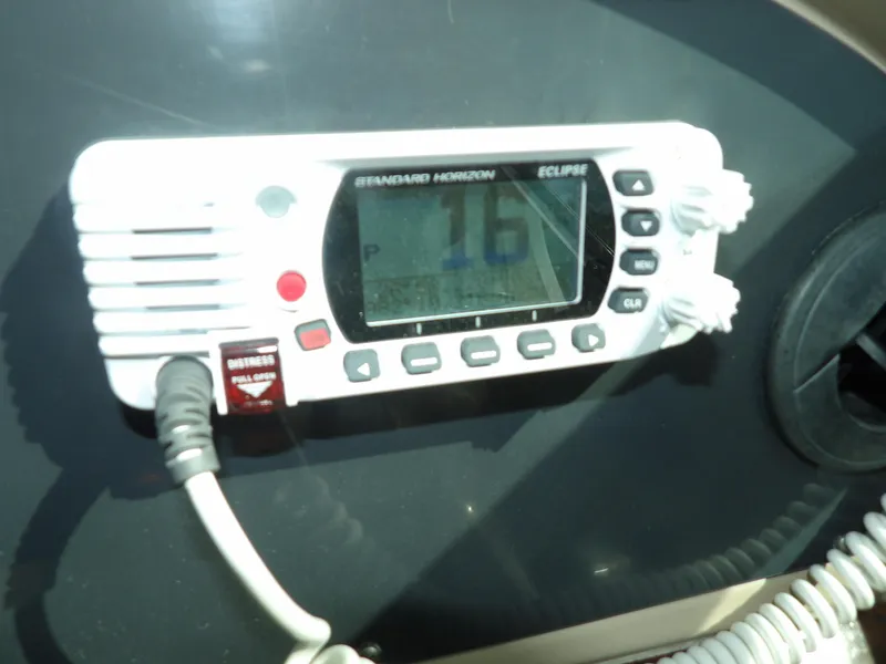 Slide: The Image of Standard Horizon Eclipse radio on 2003 Sea Ray 390 Motor Yacht dashboard. - 37