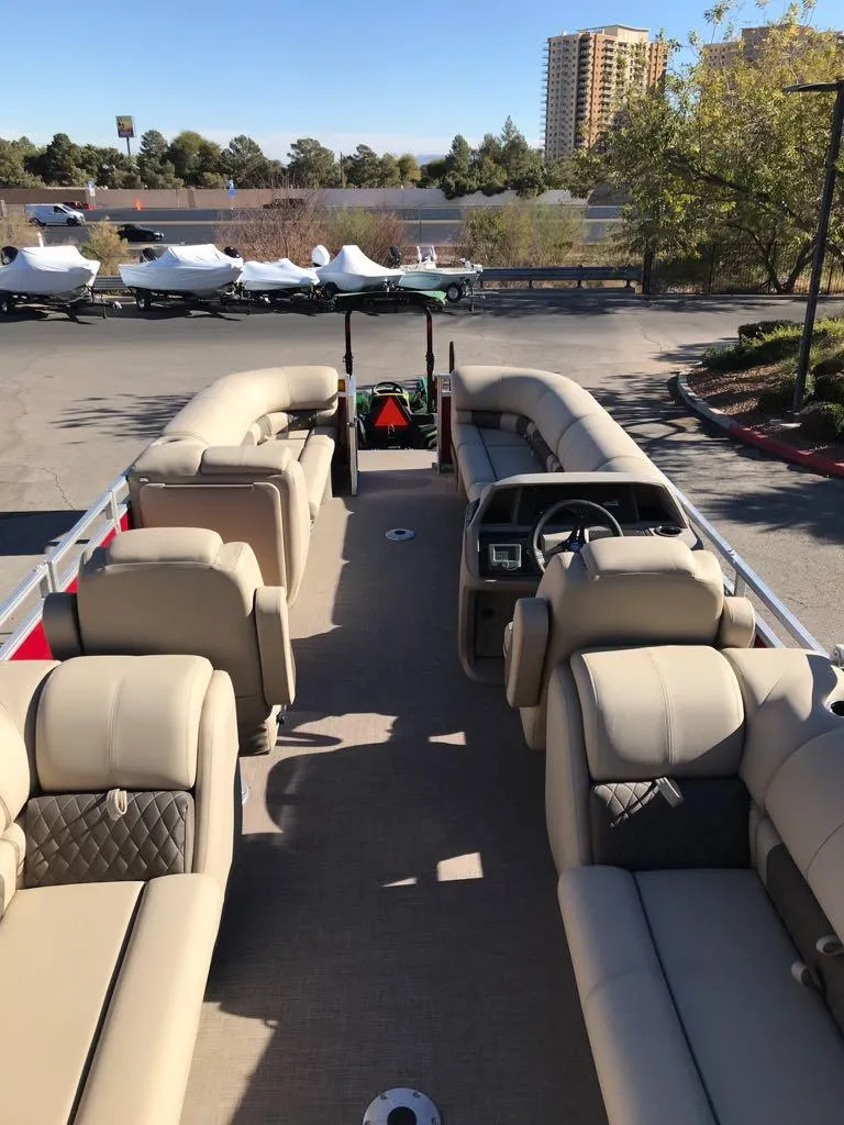 Slide: The Image of 2024 Sun Tracker Party Barge 24 DLX pontoon boat with spacious seating and modern design. - 4