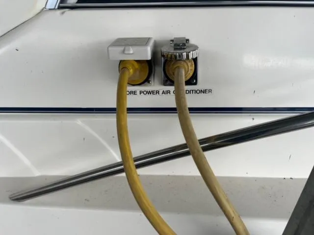 Slide: The Image of Power connections on a 2000 Rinker 310 Fiesta Vee boat. - 10
