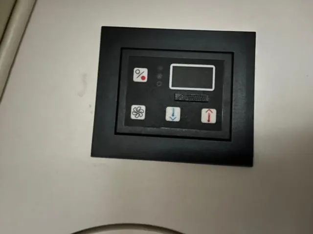 Slide: The Image of Control panel of a 2000 Rinker 310 Fiesta Vee boat. - 17