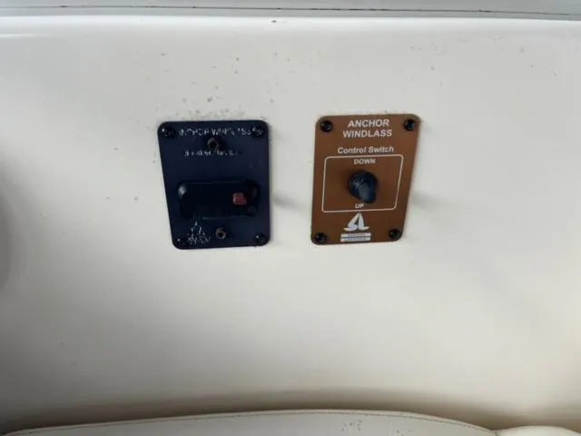 Slide: The Image of Anchor windlass control switch on a 2000 Rinker 310 Fiesta Vee boat. - 27