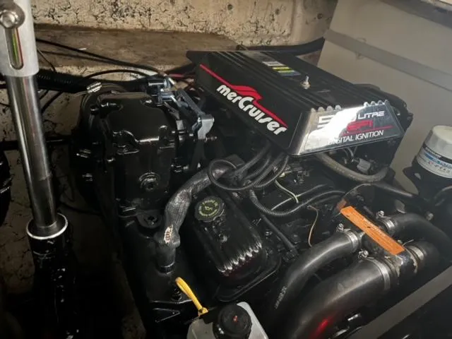 Slide: The Image of Engine compartment of a 2000 Rinker 310 Fiesta Vee with MerCruiser engine. - 32