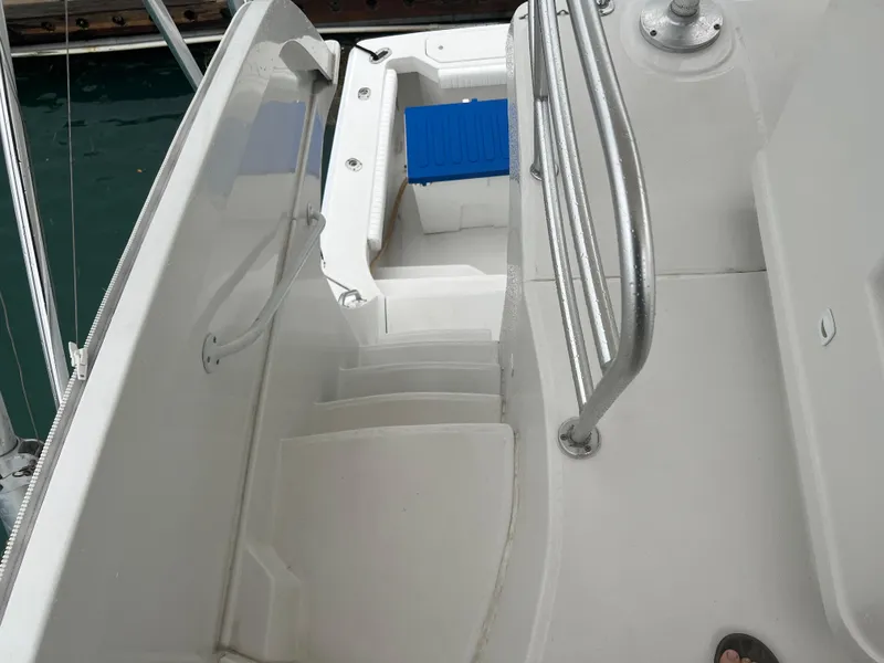 Slide: The Image of Staircase on a 2001 Luhrs 34 Convertible boat leading to the lower deck. - 14
