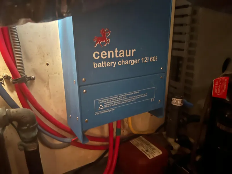 Slide: The Image of Centaur battery charger in a 2001 Luhrs 34 Convertible boat. - 29