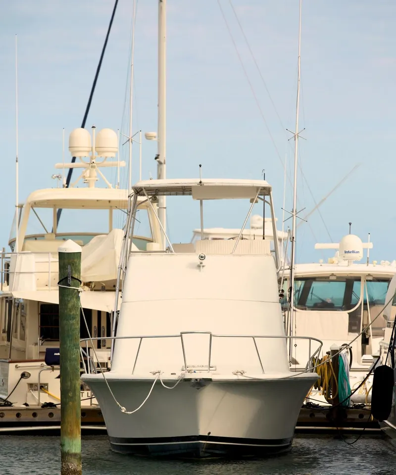 Slide: The Image of 2001 Luhrs 34 Convertible yacht docked at marina. - 4