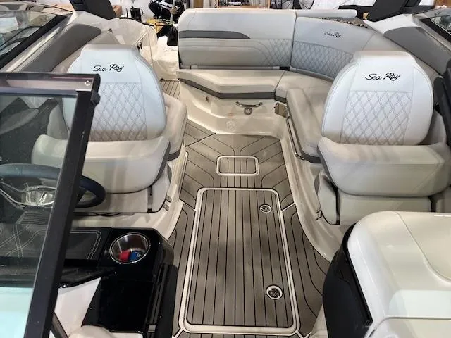Slide: The Image of 2024 Sea Ray SLX 260 boat interior with luxurious seating and modern design. - 10