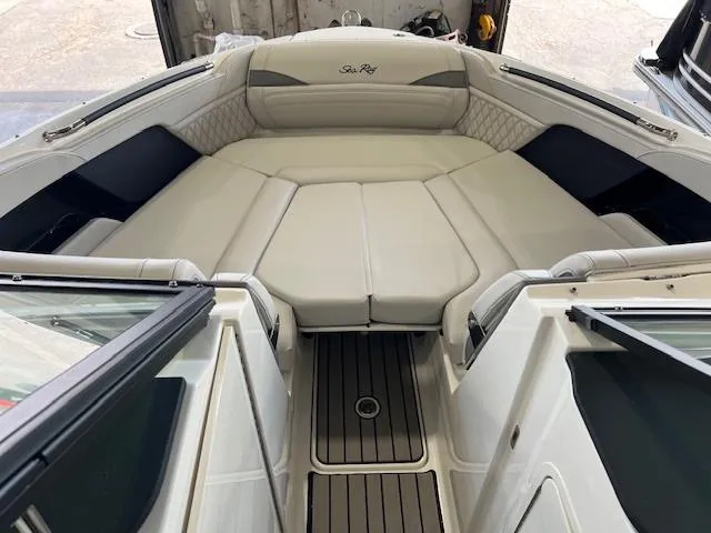 Slide: The Image of 2024 Sea Ray SLX 260 boat interior with luxurious seating and modern design. - 4