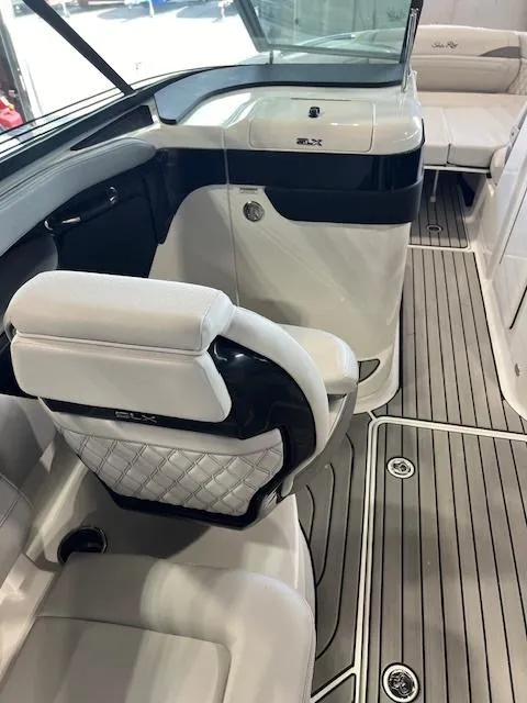 Slide: The Image of 2024 Sea Ray SLX 260 boat interior with modern seating and sleek design. - 6