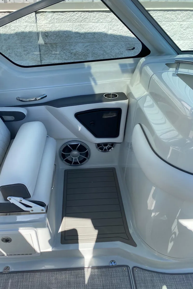 Slide: The Image of 2024 Finseeker 280 DC boat interior with seating and speakers. - 19