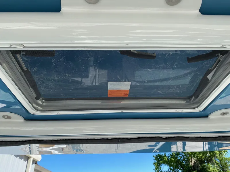 Slide: The Image of 2024 Finseeker 280 DC boat roof hatch with mesh screen. - 43