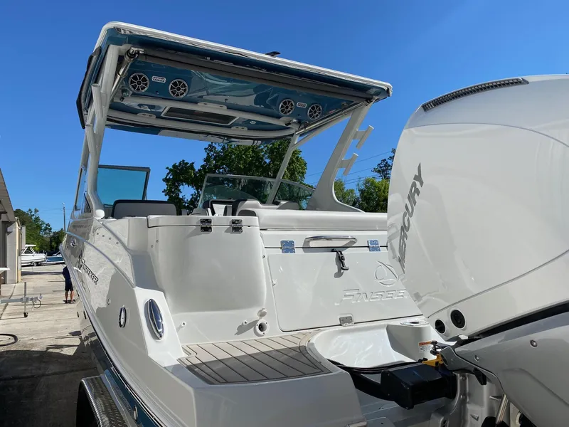 Slide: The Image of 2024 Finseeker 280 DC boat with Mercury outboard engine. - 5