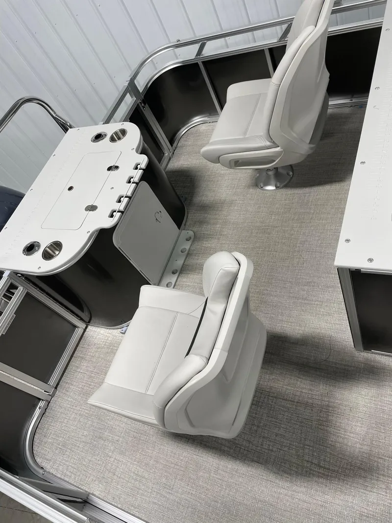 Slide: The Image of 2024 Avalon Venture 85 Rear Fish boat interior with seating and fishing station. - 18