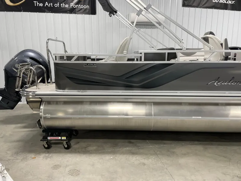 Slide: The Image of 2024 Avalon Venture 85 Rear Fish pontoon boat in showroom. - 7