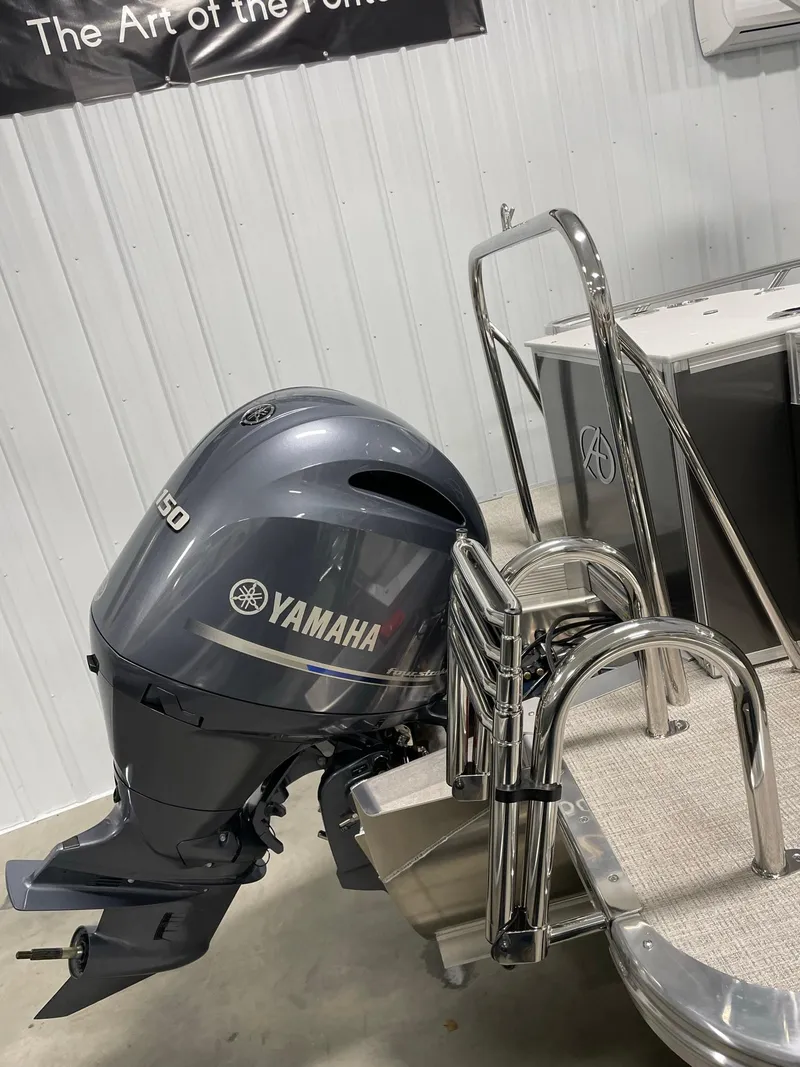 Slide: The Image of 2024 Avalon Venture 85 Rear Fish with Yamaha outboard motor in showroom. - 8