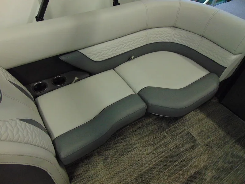 Slide: The Image of 2024 Godfrey Monaco 235 SFL iMPACT Package boat interior seating with cup holders. - 12