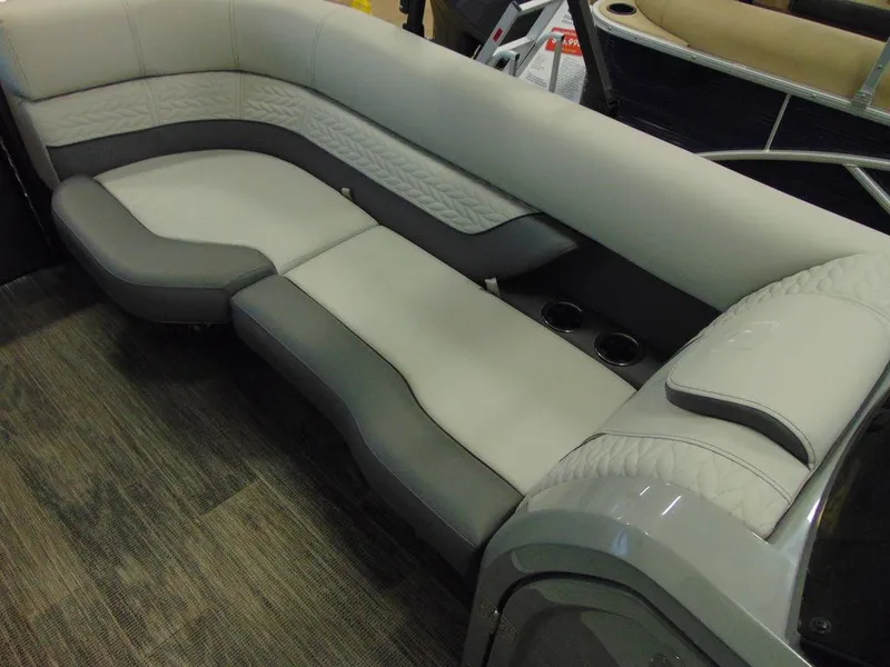 Slide: The Image of 2024 Godfrey Monaco 235 SFL iMPACT Package boat interior seating with cup holders. - 13